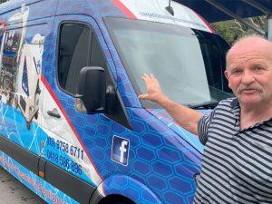 Jeff Whyte with his van giving a testimonial for Enviro Plus Car Wash.